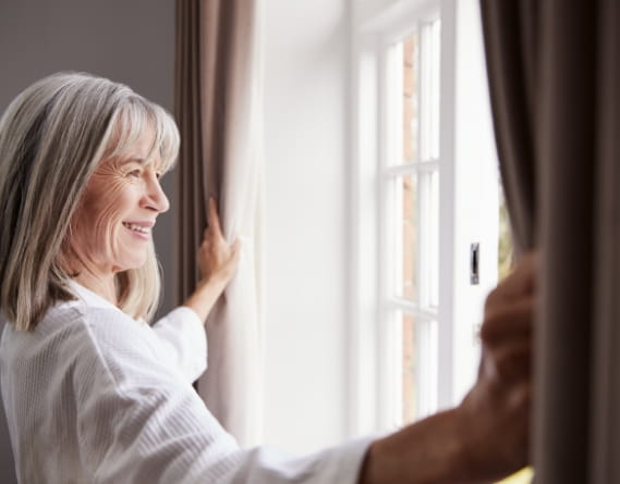 Assisting Elderly Woman in Transitioning to a Cozier Home.